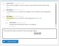 A threaded comment feed on a record in CtrlPortals: three comments, a reply indented under the one it answers, mentions highlighted in the text, and a new comment being written with a colleague's name suggested as it is typed.